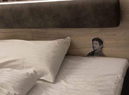 Picture of Pedro Pascal on my hotel bed